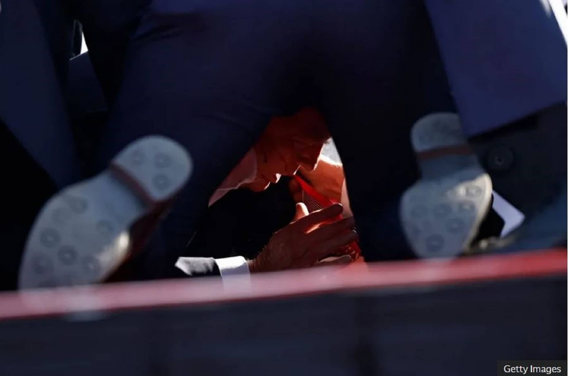 [IMAGE of President Donald J. Trump Wrestled To The Ground By Secret Service Agents Moments After Being Shot By An Assassin, July 13, 2024.JPG]